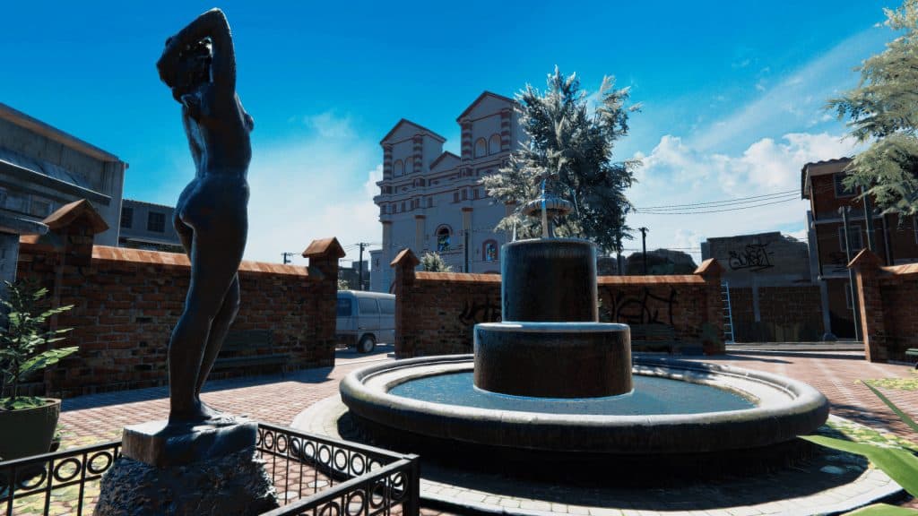 Vintage city square fountain with a bronze sculpture of a woman, surrounded by brick walls and trees, under bright blue sky in a realistic 3D-rendered environment.