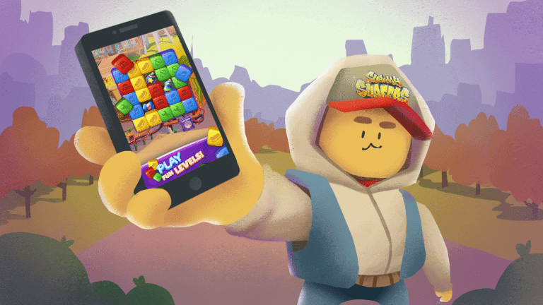Victory game character holding smartphone with match-three puzzle display in a colourful outdoor park scene.